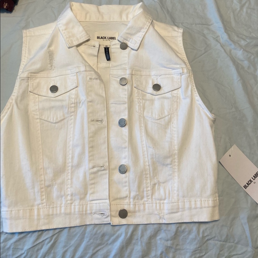 White jean vest with distressed detailing